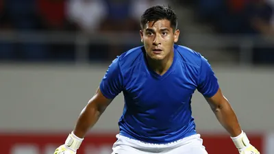 A photorealistic image of an anonymous Querétaro player, aged 25-30, wearing a blue jersey and white shorts, with a white...